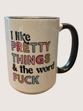 Mug with colorful text design on a white background