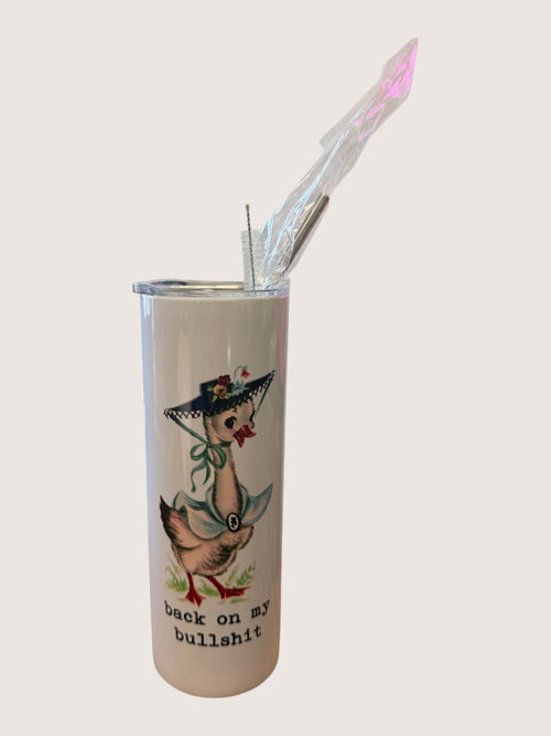 Tumbler with a duck design and text on a white background