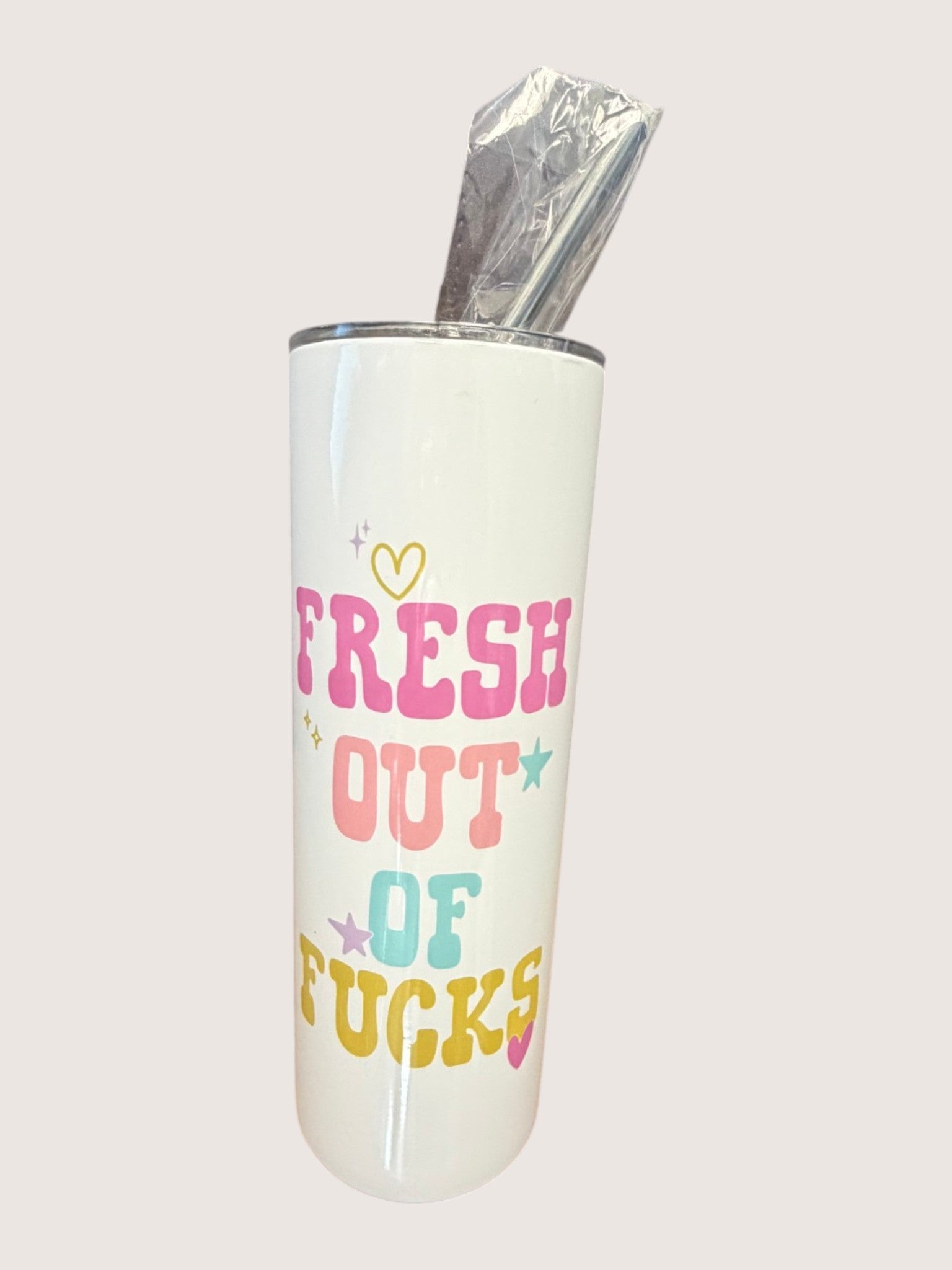 Tumbler with colorful text on a white background
