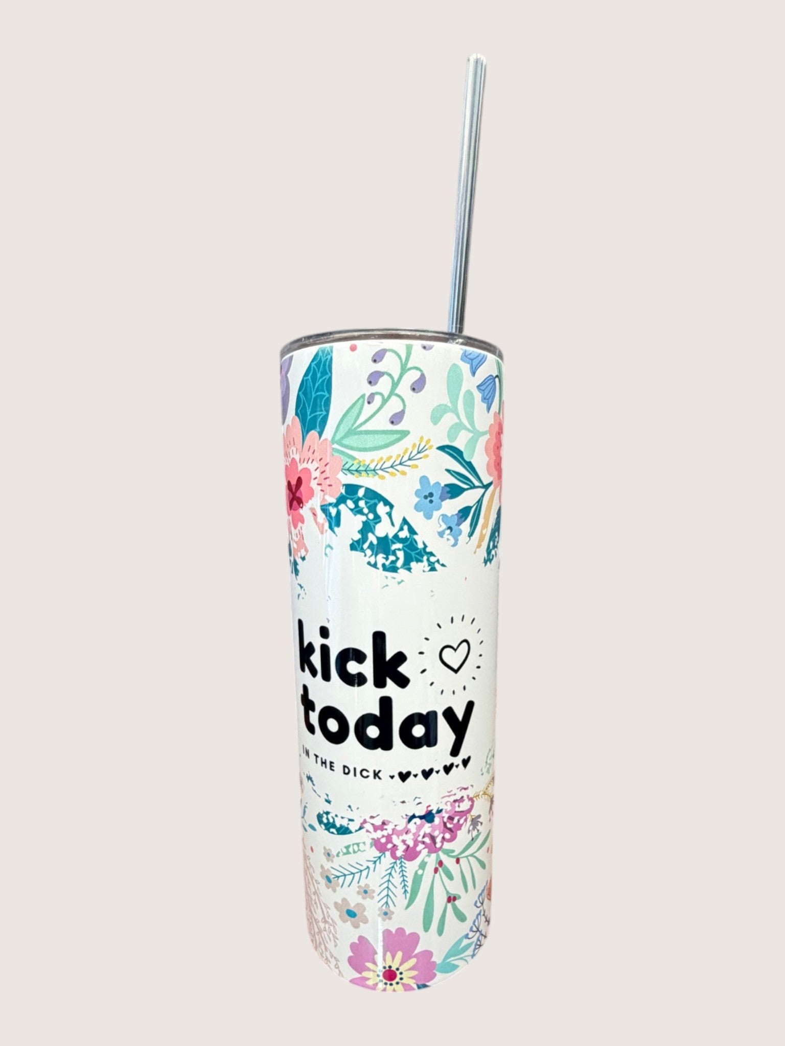 Tumbler with floral design and text on a white background