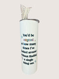 White tumbler with colorful text on a white background