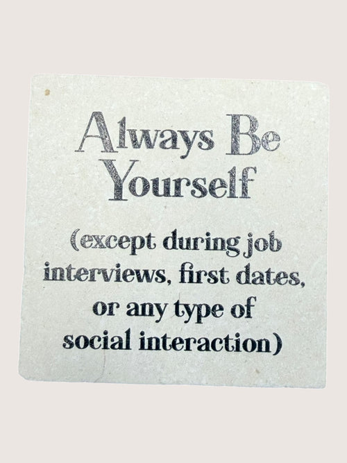 Motivational Coaster with text 'Always Be Yourself (except during job interviews, first dates, or any type of social interaction)' on a light background.