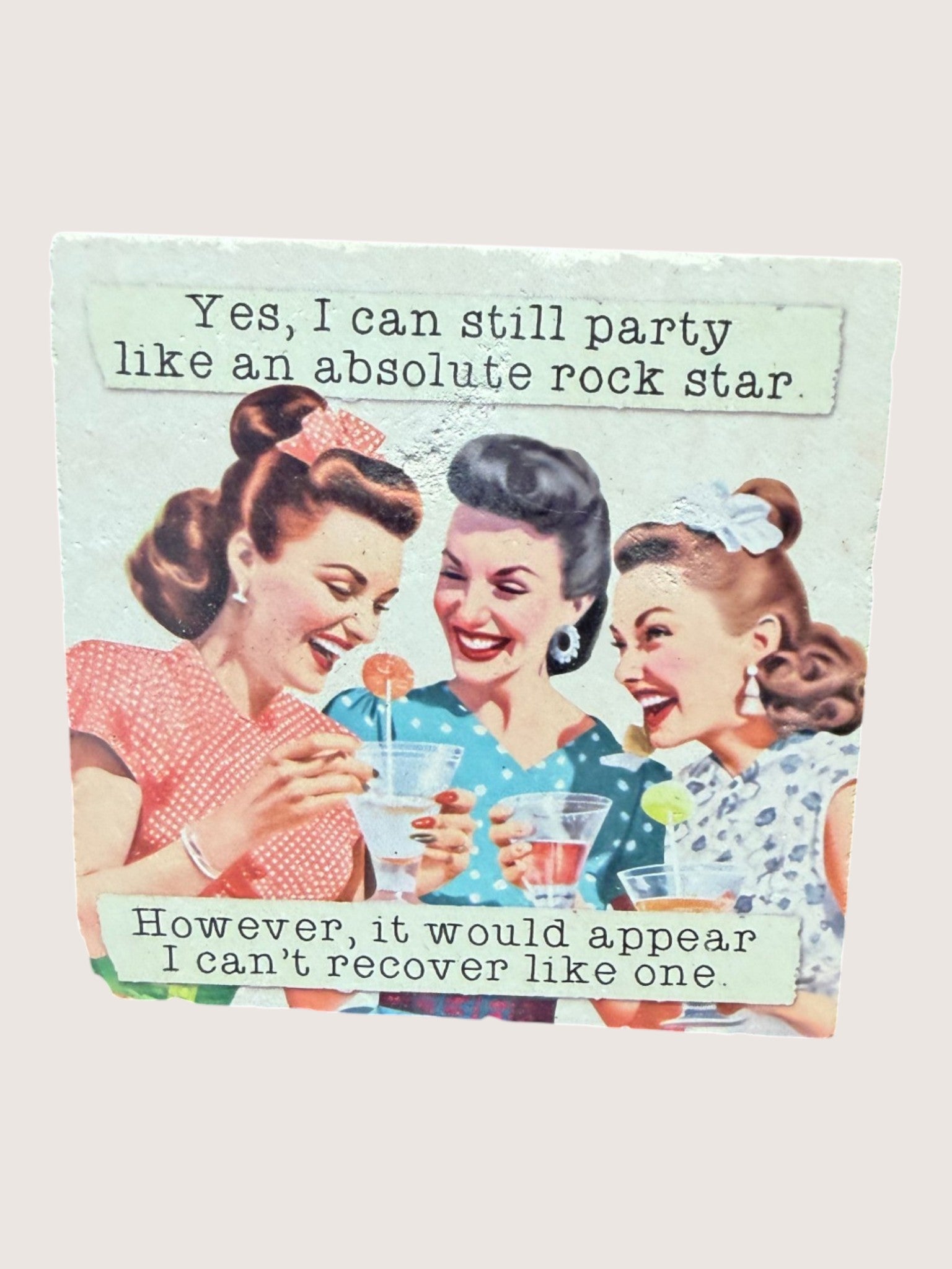 Vintage-style illustration Coaster of three women partying with text about partying like a rock star.