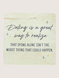 Wooden Coaster with a humorous quote about dating on a light background