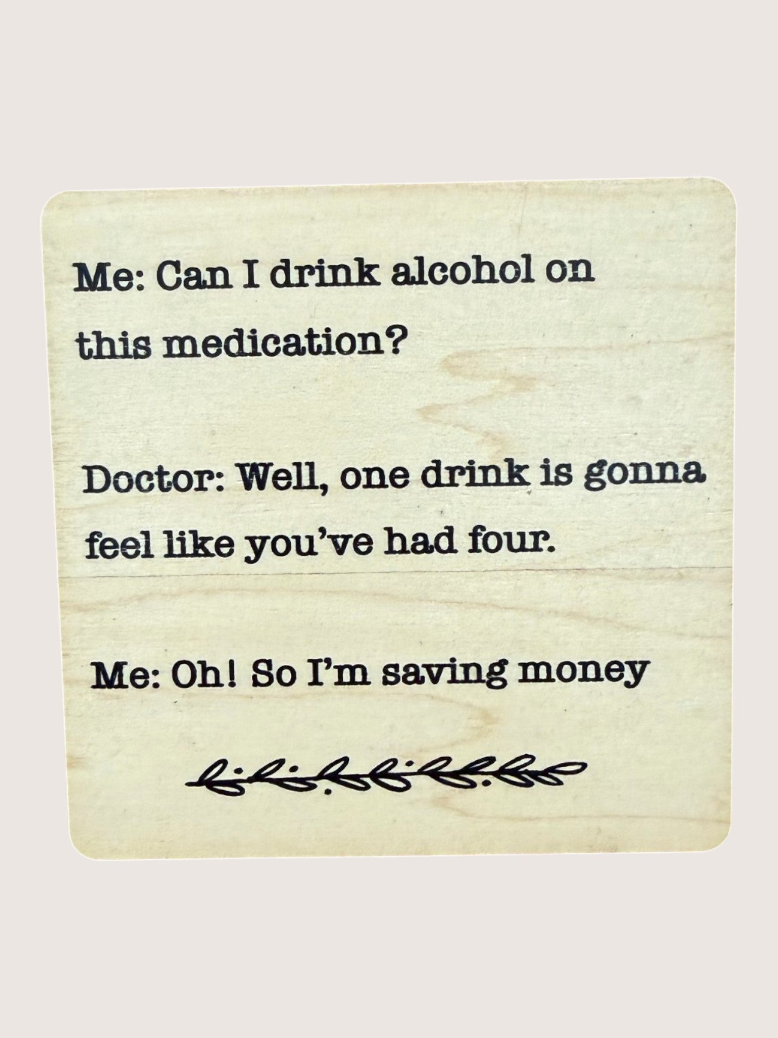 coaster with Text on a light background about drinking alcohol on medication