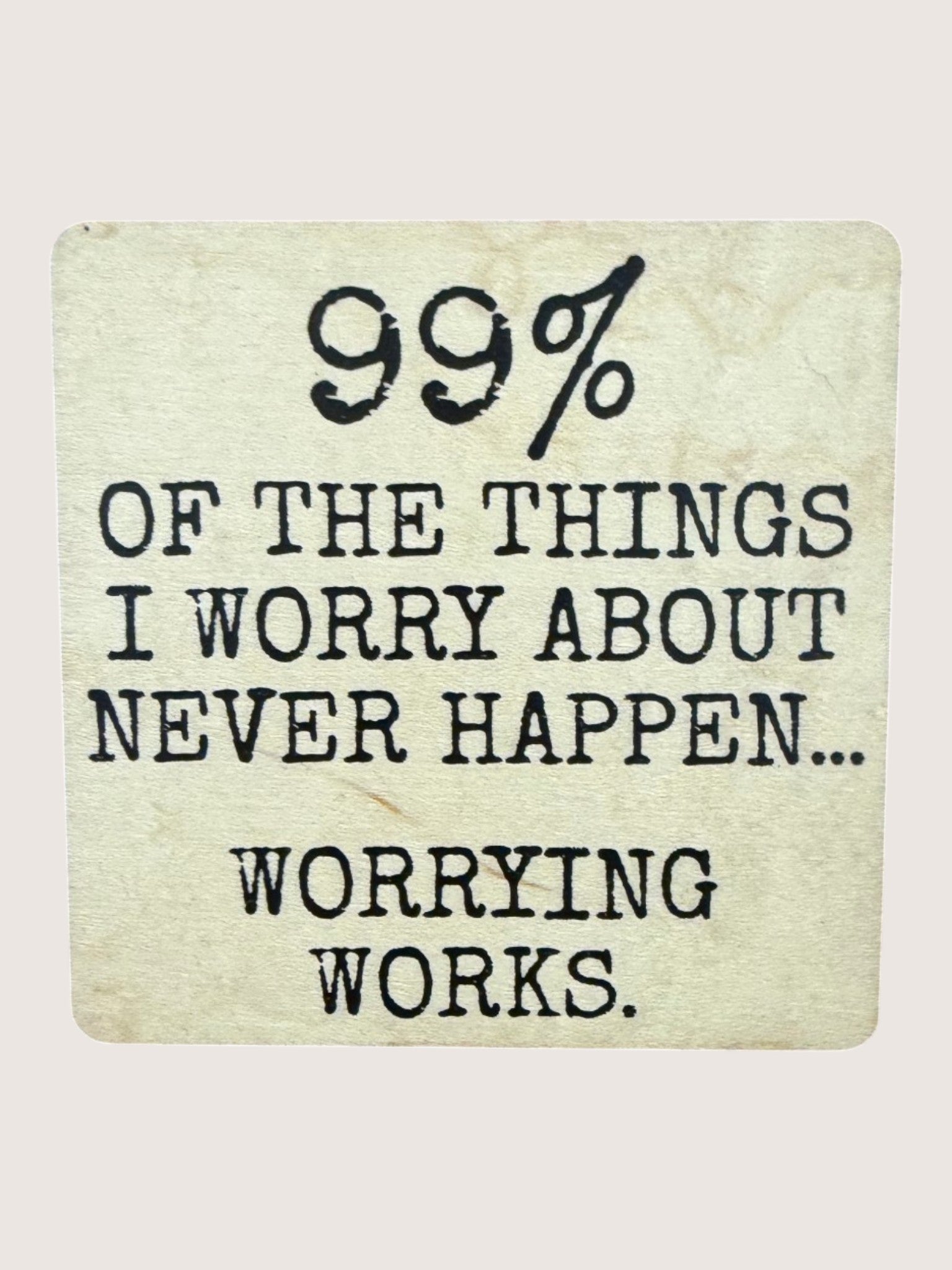 coaster with Motivational quote on a textured background