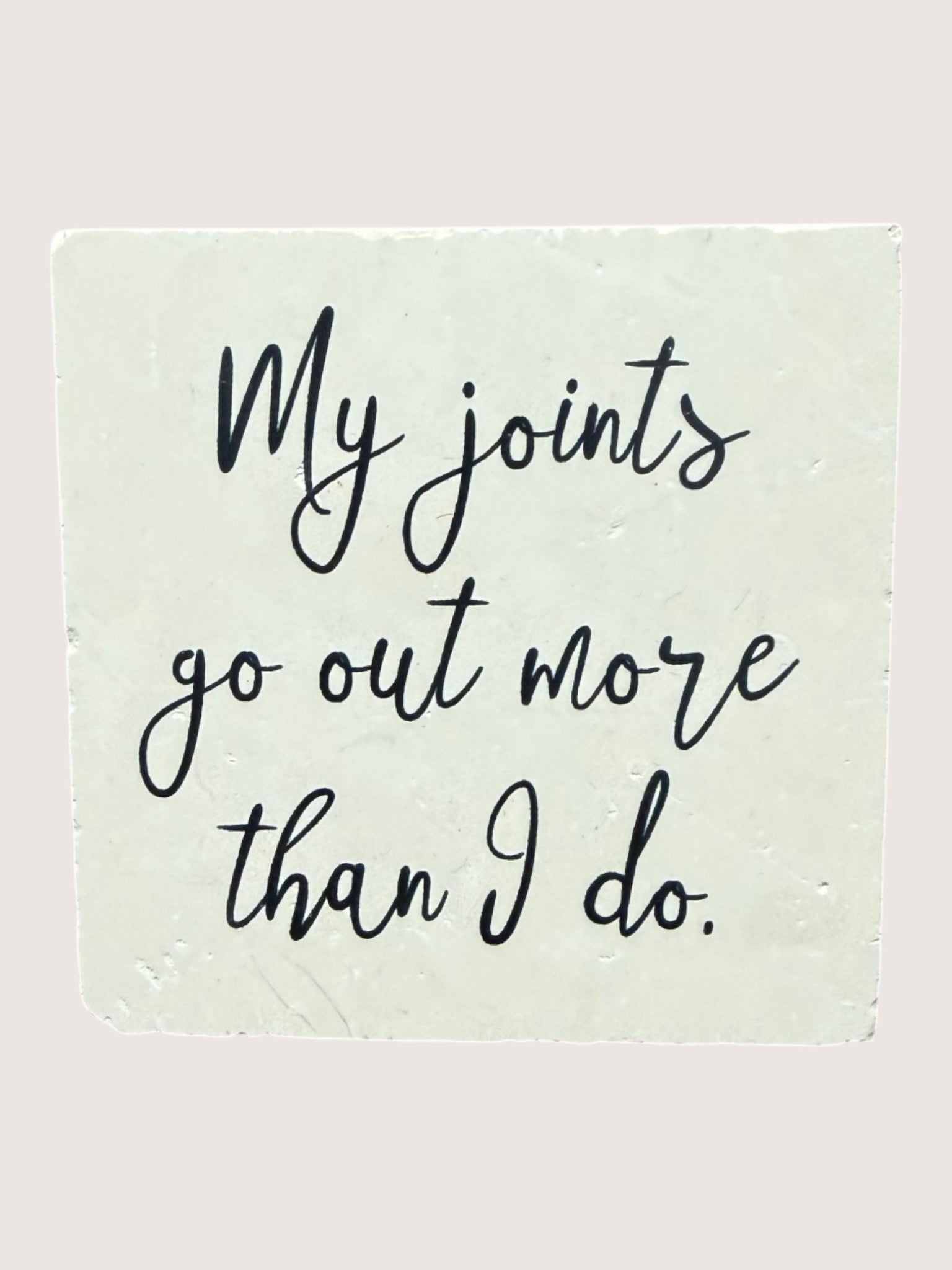 Text 'My joints go out more than I do.' on a light green background