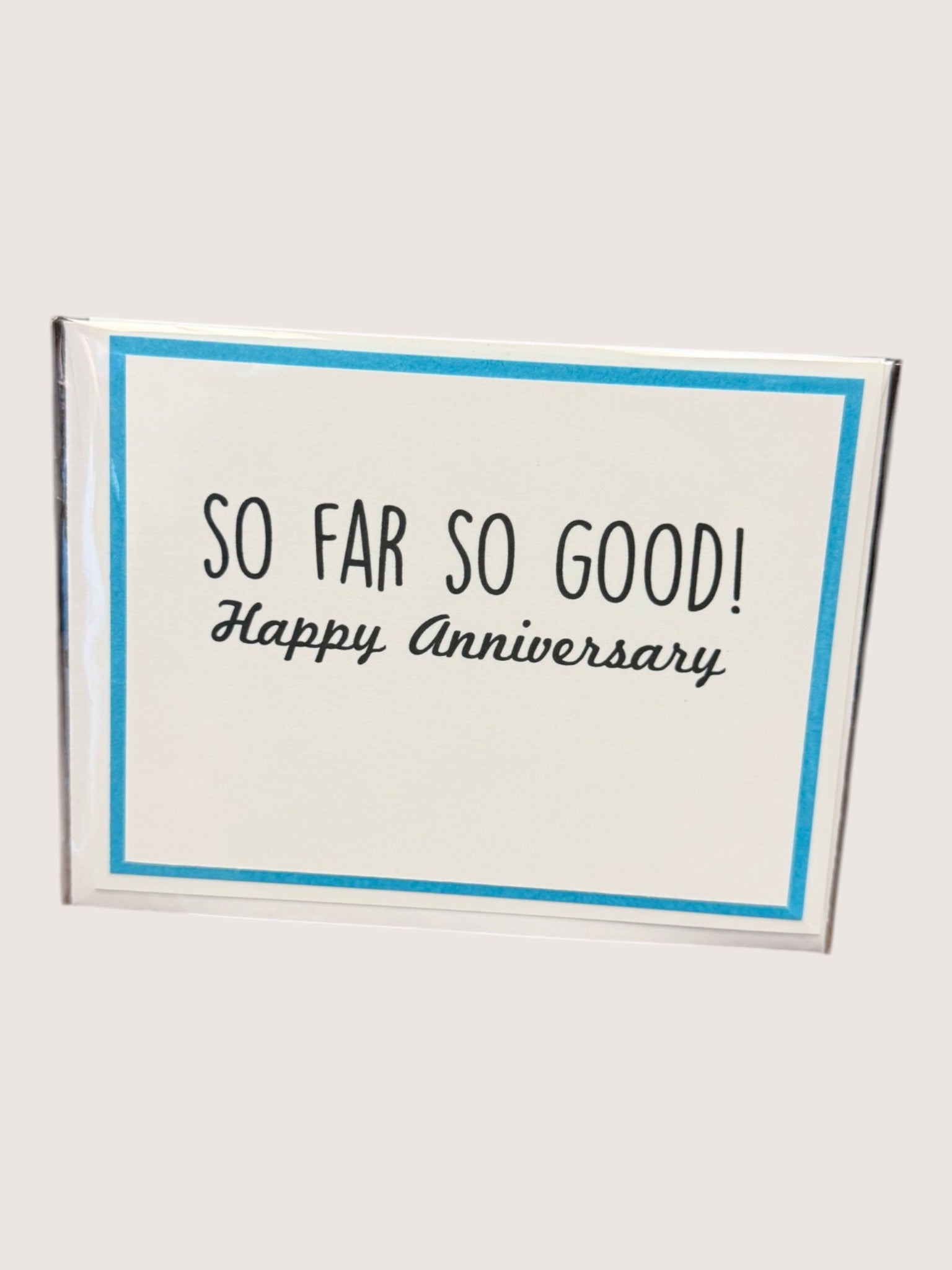 Card with 'So Far So Good! Happy Anniversary' text on a white background