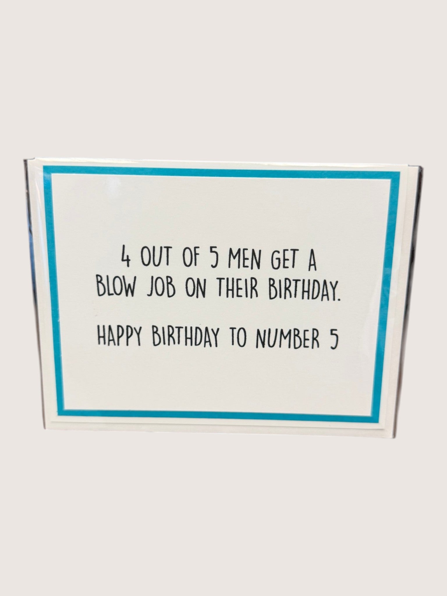 Birthday card with humorous text on a white background