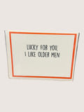 Card with text 'Lucky for you, I like older men' on a white background
