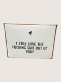 White card with black text and a heart symbol on a white background