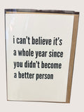Card with humorous text on a plain background