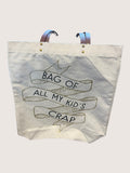 Tote bag with text 'Bag of all my kid's crap' on a light background