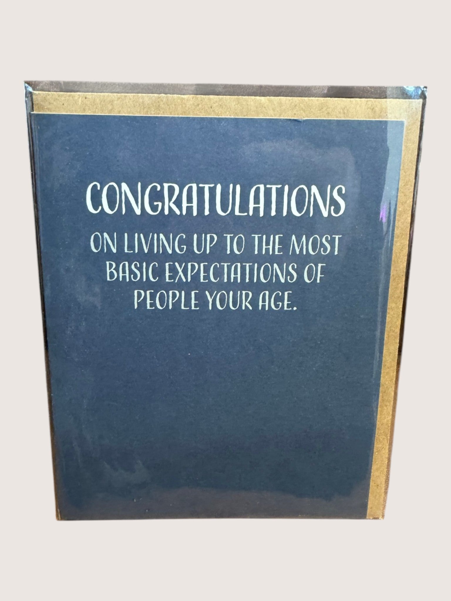 card with text 'congratuations on living up to the most basic expectations of people your age'