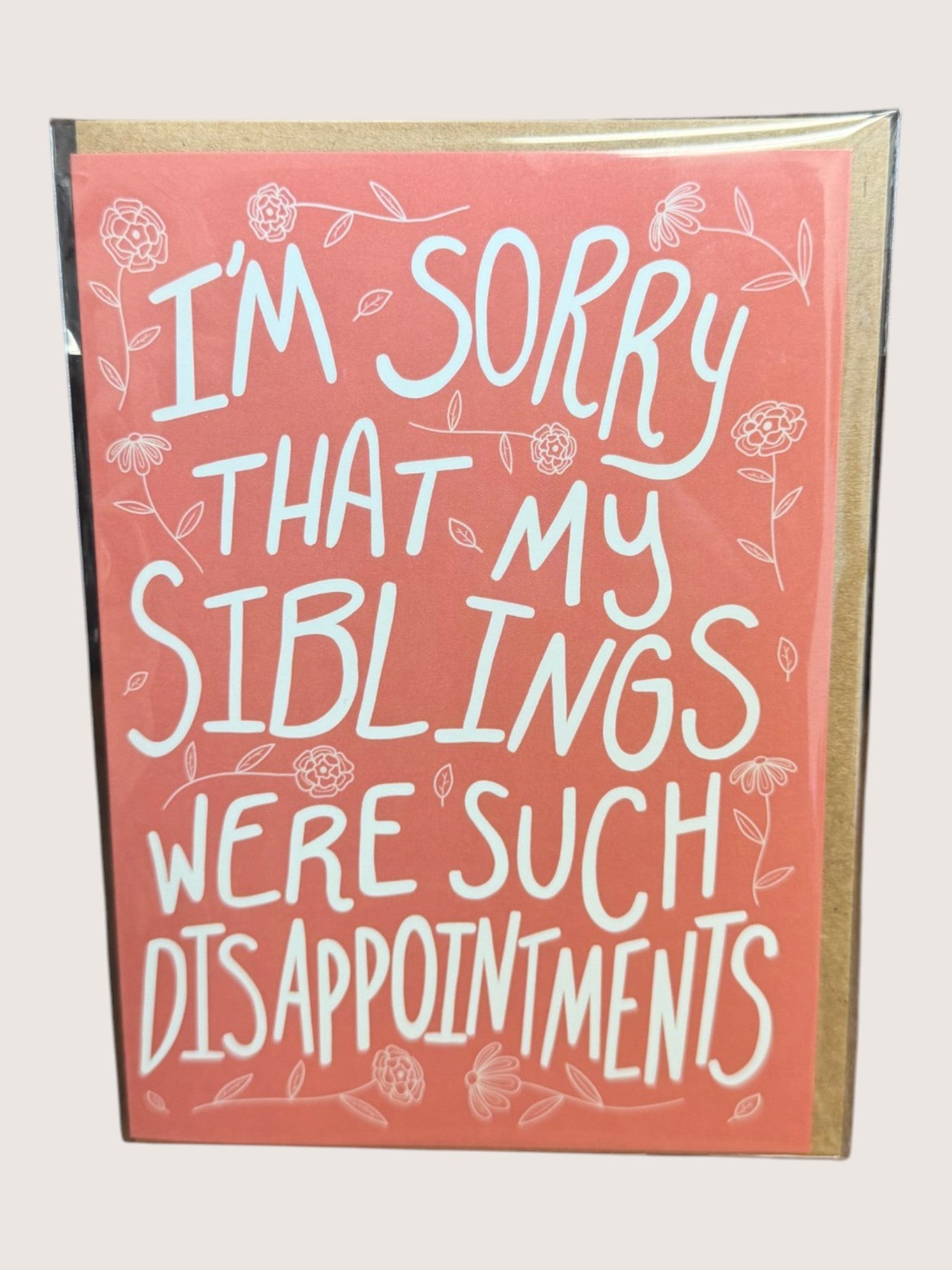 card with text 'i'm sorry that my siblings were such disappointments'