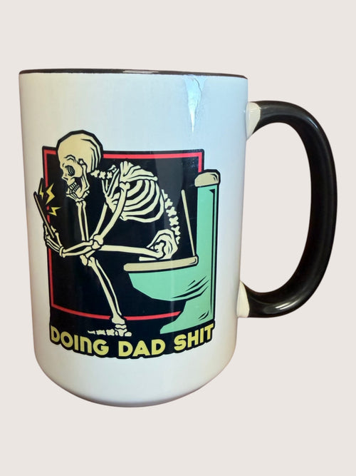 Mug with skeleton design and text on a white background