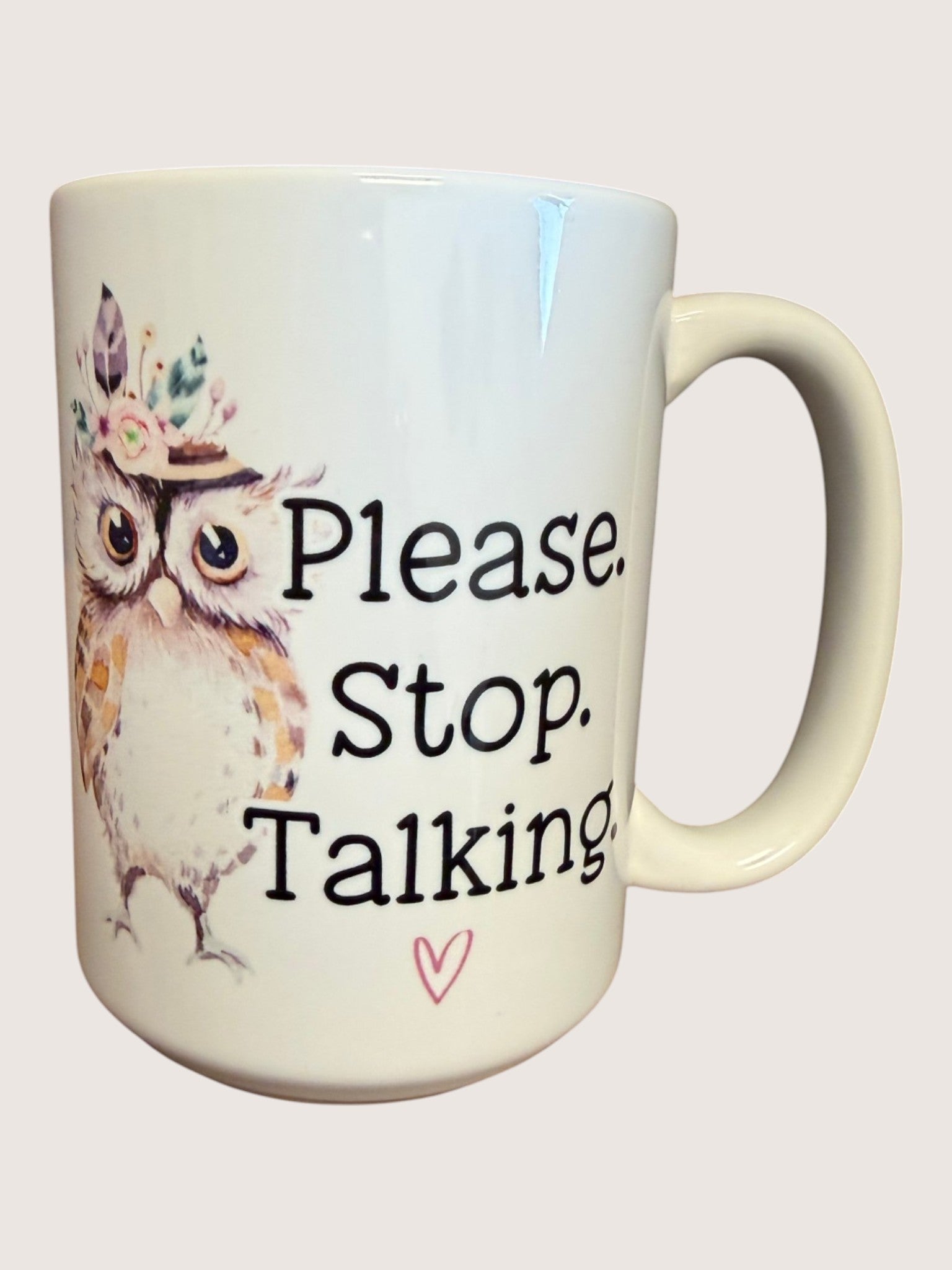 Mug with owl design and text 'Please Stop Talking' on a white background