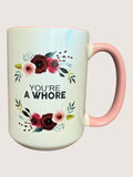 Mug with floral design and text on a light background