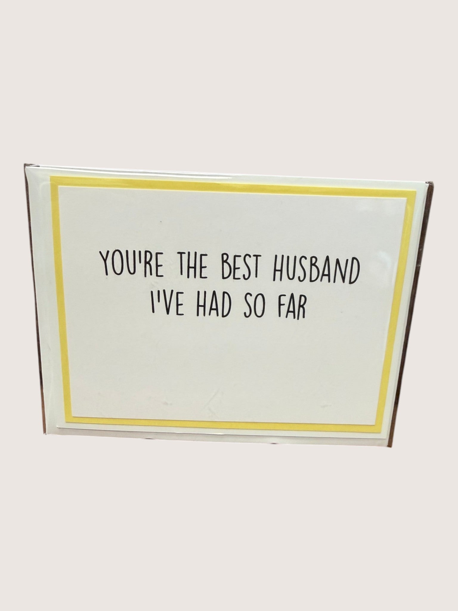 Card with text 'You're the best husband I've had so far' on a white background