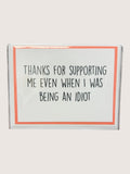 Card with text 'Thanks for supporting me even when I was being an idiot' on a white background