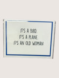 card with humorous text 'It's a bird. It's a plane. It's an old woman' on a white background.