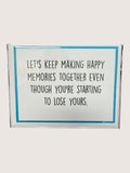 Card with a humorous message about making happy memories on a white background