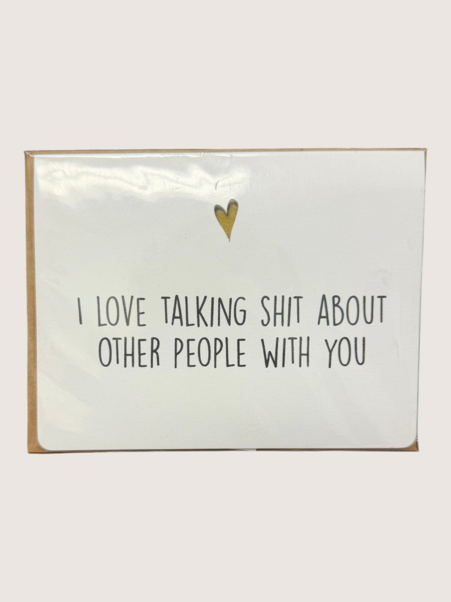 Card with text 'I love talking shit about other people with you' and a heart symbol on a white background.