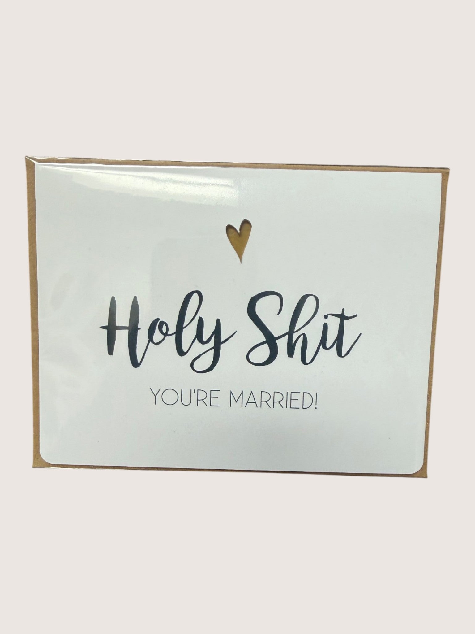 Card with text 'Holy Shit You're Married!' on a light background