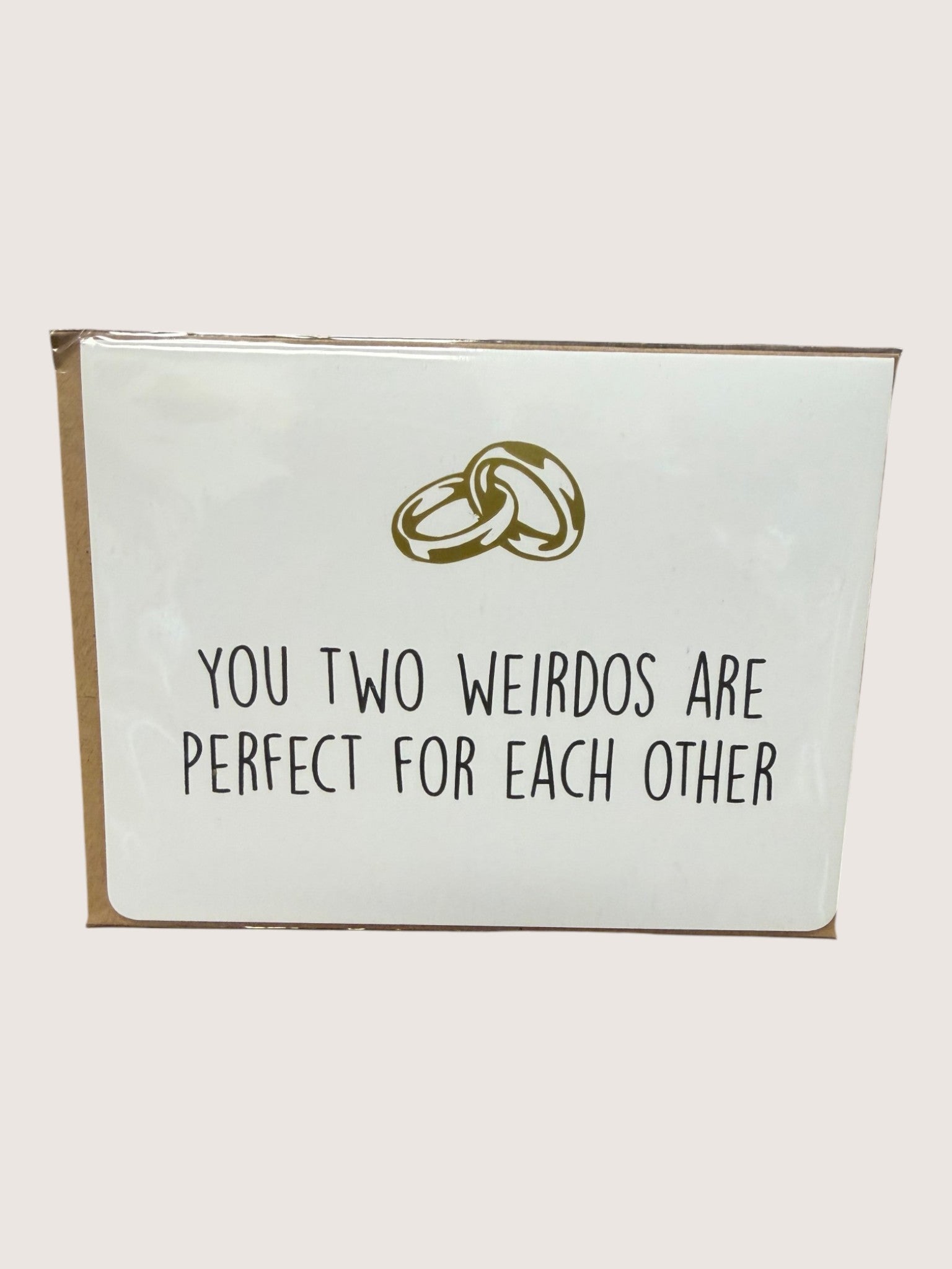 Card with two interlocking rings and text 'You two weirdos are perfect for each other' on a white background