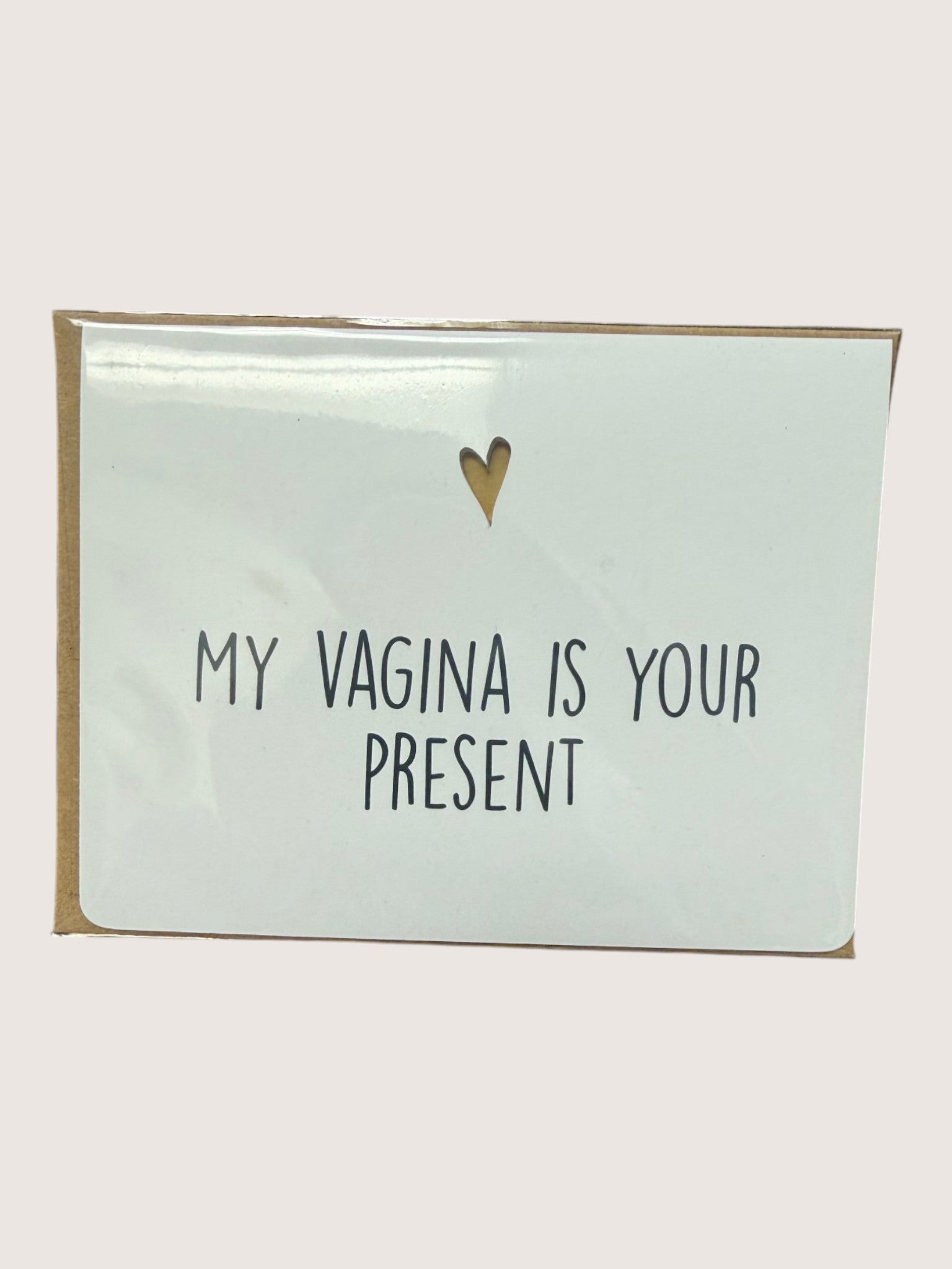 Card with text 'My vagina is your present' on a light background