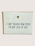 Card with text 'I can't believe how much I'm not sick of you' and a heart symbol on a light green background.
