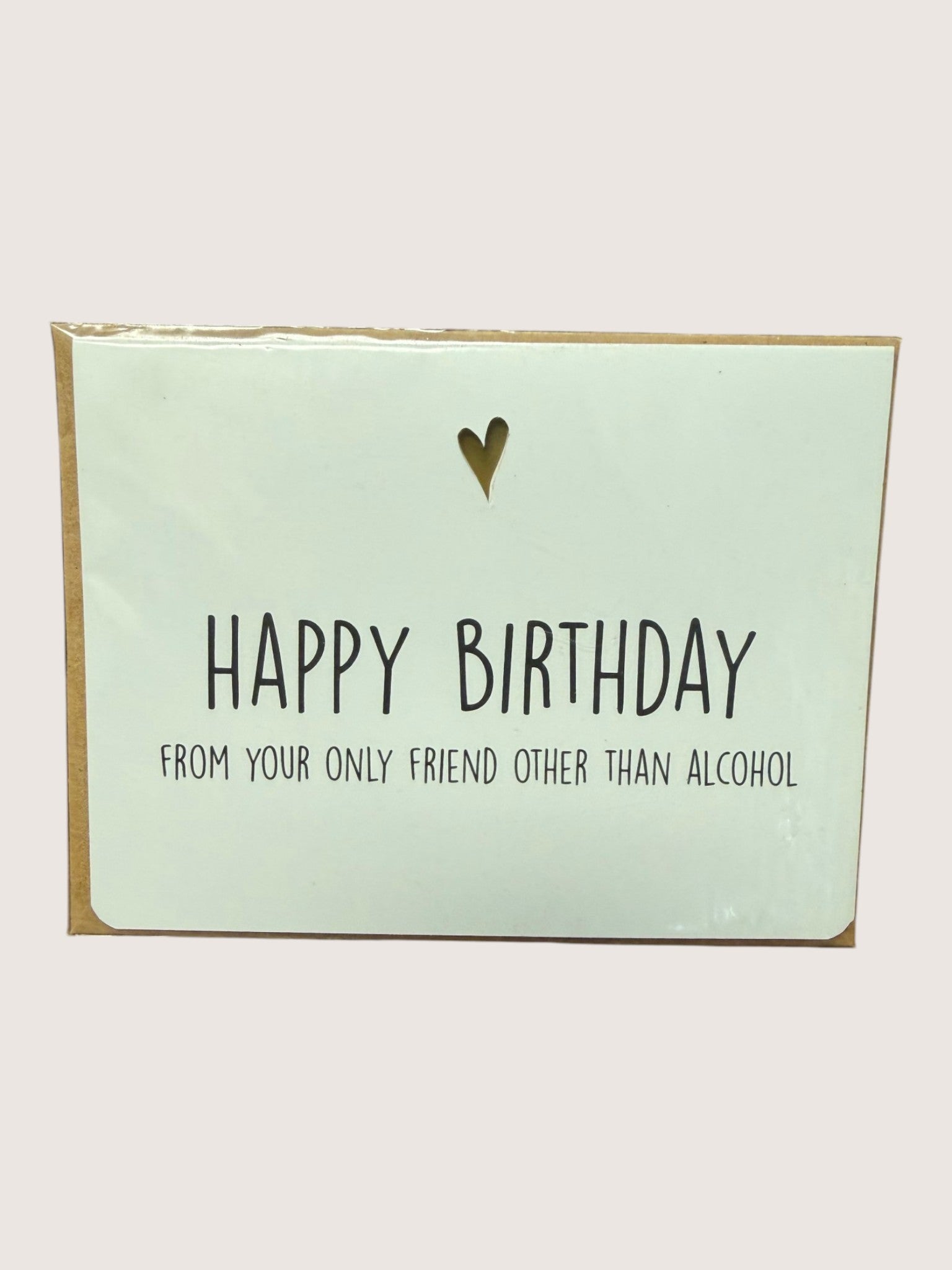 Birthday card with humorous text on a light green background