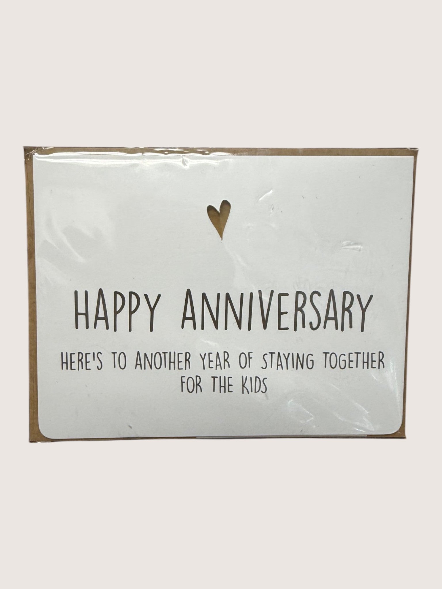 Packaged card with 'Happy Anniversary' text and heart symbol on a white background