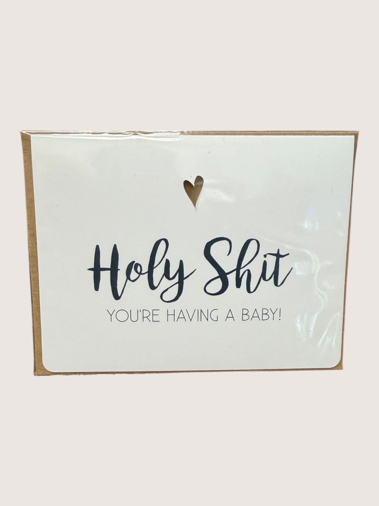 Card with text 'Holy Shit, you're having a baby!' on a white background