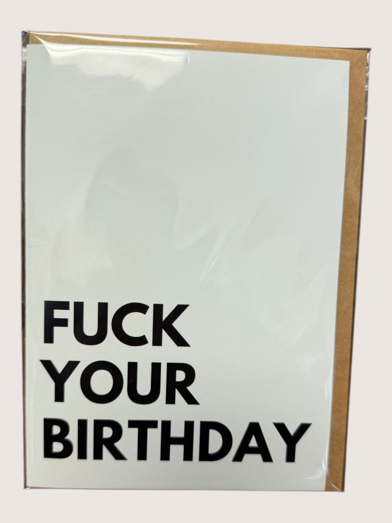Card with 'Fuck Your Birthday' text on a white background