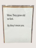 White card with black text on a white background