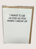 Card with text 'I want to be as old as you when I grow up' on a white background