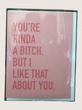 Card with red text on a pink background, framed in black.