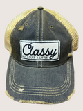 Denim cap with mesh back and 'Classy But I Cuss A Little' patch on a light gray background