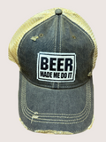 Cap with 'BEER MADE ME DO IT' text on a beige background