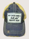Blue and yellow cap with a humorous patch on a light gray background