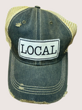 Denim cap with 'LOCAL' patch on a light gray background