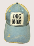 Light blue cap with 'DOG MOM' patch on a light gray background