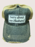 Vintage-style cap with 'Sorry about my Husband' text on a light gray background