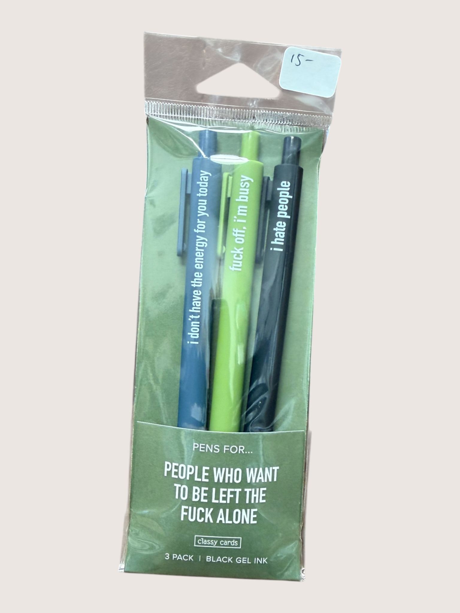 Packaged set of pens with humorous text on a light gray background
