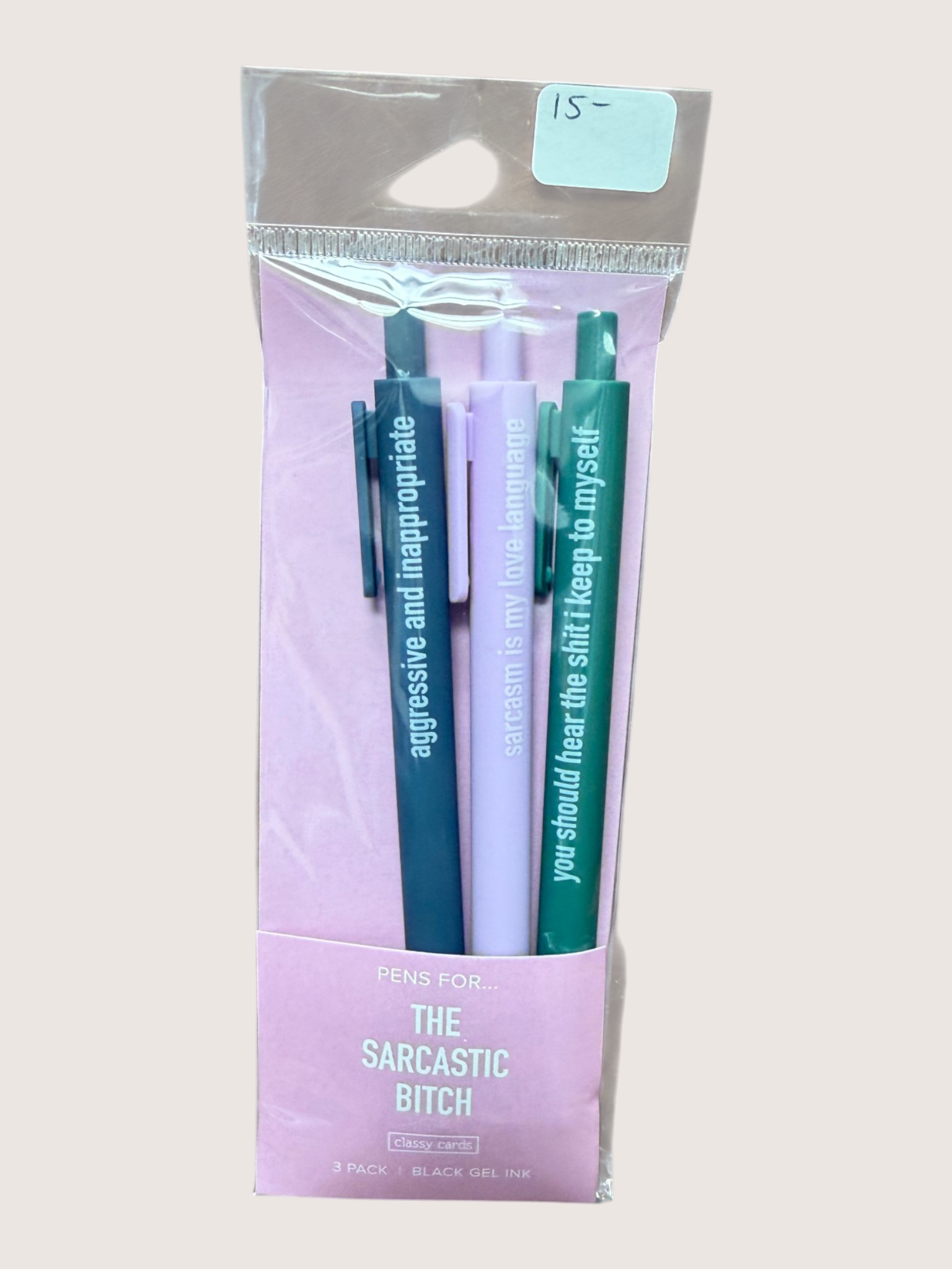 Packaged set of pens with humorous text on a light gray background
