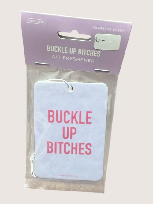 Air freshener with 'Buckle Up Bitches' text in clear packaging on a light background