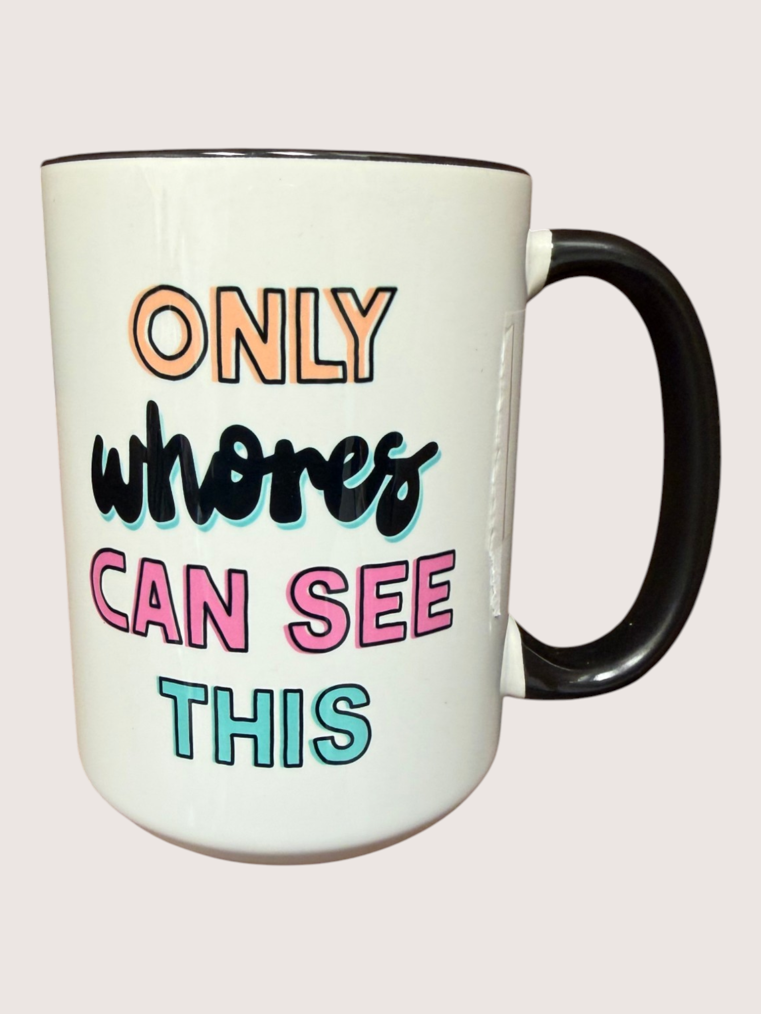 Mug with colorful text on a white background