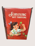 Vintage-style book with a child and text 'Surviving Not Thriving' on a red background.