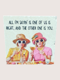coaster Two women sitting at a table with drinks, wearing hats and sunglasses, with a quote above them.